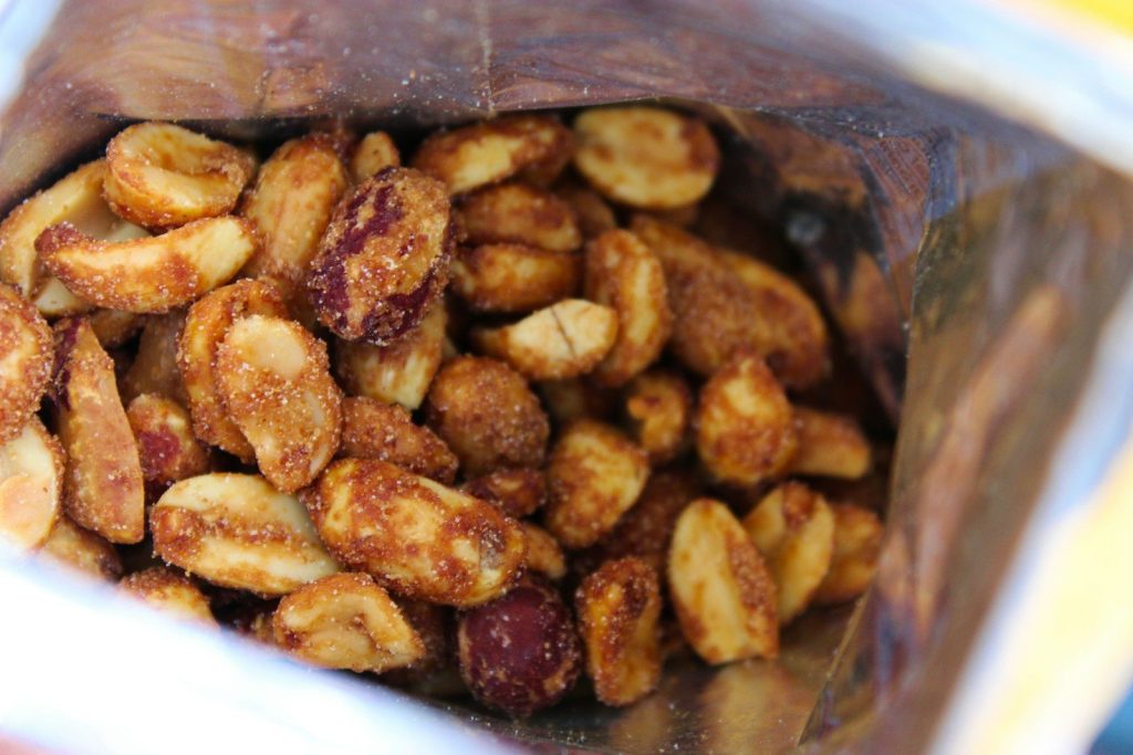 Close-up of roasted peanuts in a bag