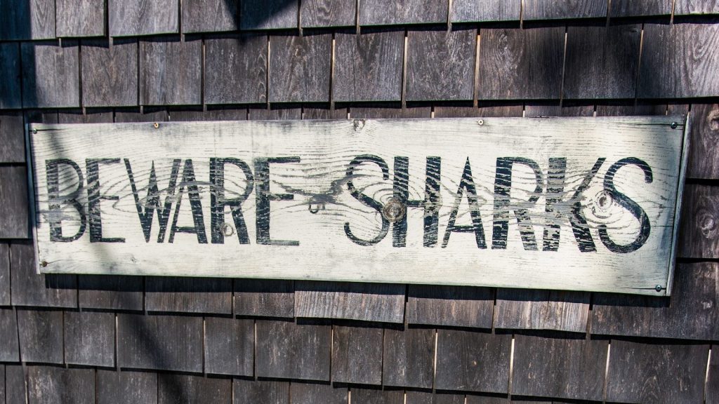 A sign that is on the side of a building