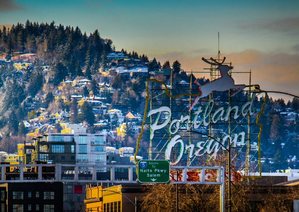 a city with a mountain in the background