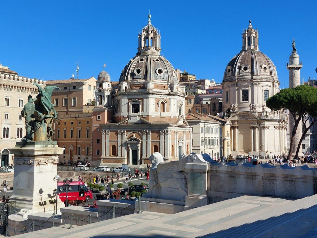 a large building with a statue in front of it
