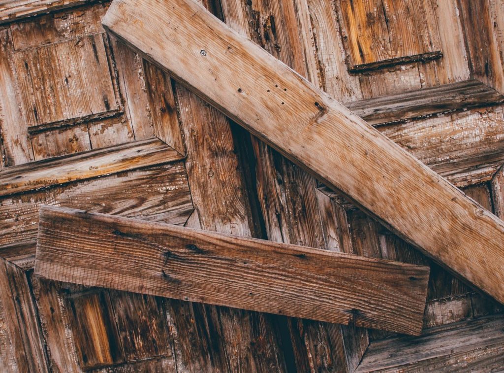 Close-up of rustic wooden boards with vintage texture. Ideal for backgrounds or design elements.