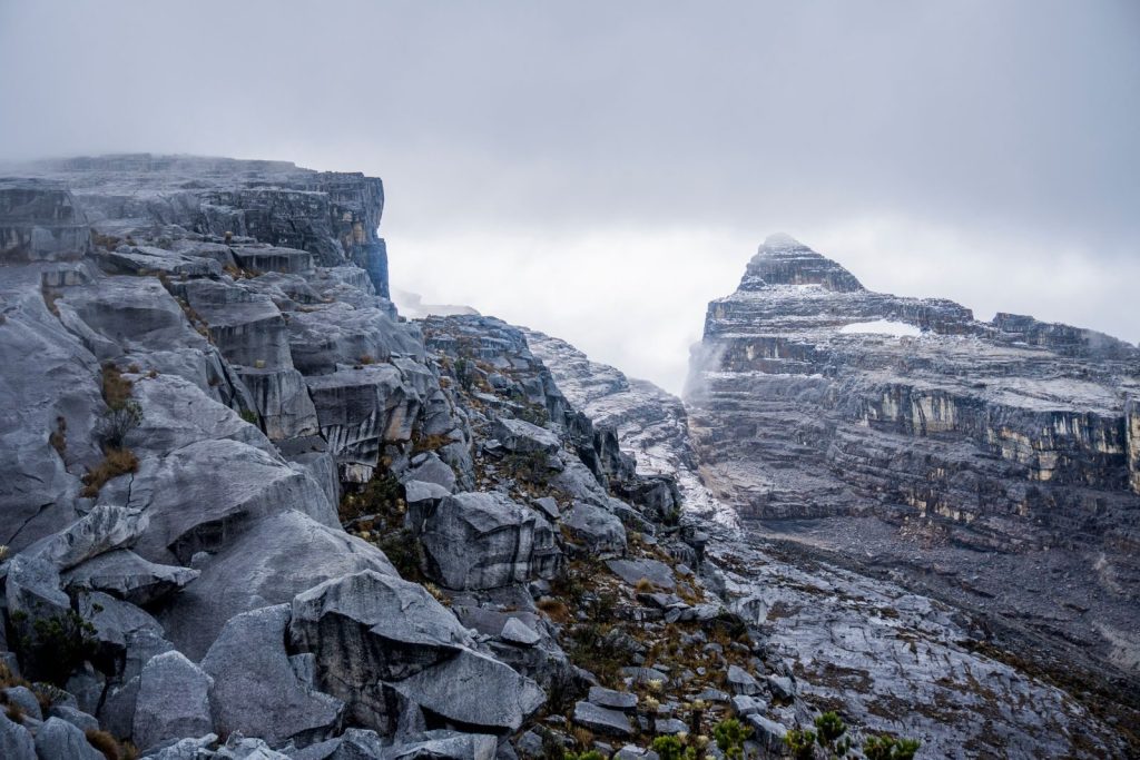 Explore the rugged rock formations of El Cocuy in this breathtaking overcast scene.
