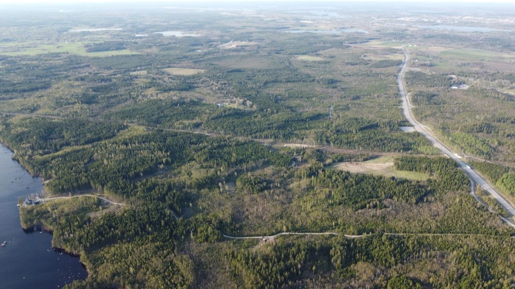 Stunning aerial view of lush greenery and expansive landscape in Kronobergs län, Sweden.